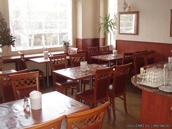 ซิตี้ โฮเทล อัม คูร์เฟือร์ชเตนดัม Hotel เบอร์ลิน ร้านอาหาร รูปภาพ